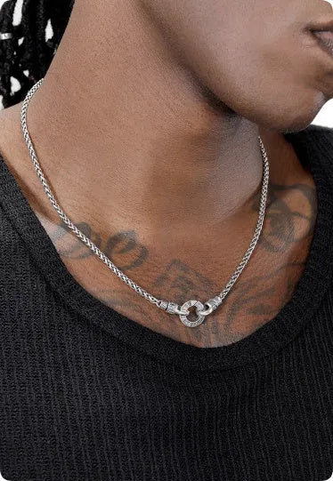 Delicate sterling silver clavicle necklace with pendant on a silver chain.