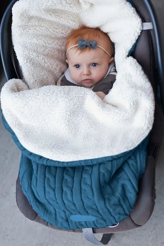 Baby stroller sleeping bag with thick filling in envelope design, shown in beige colour.