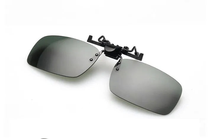 A clip-on sunglasses attachment for prescription glasses, shown in large and small sizes with grey, dark green, and night vision tinted PC lenses.