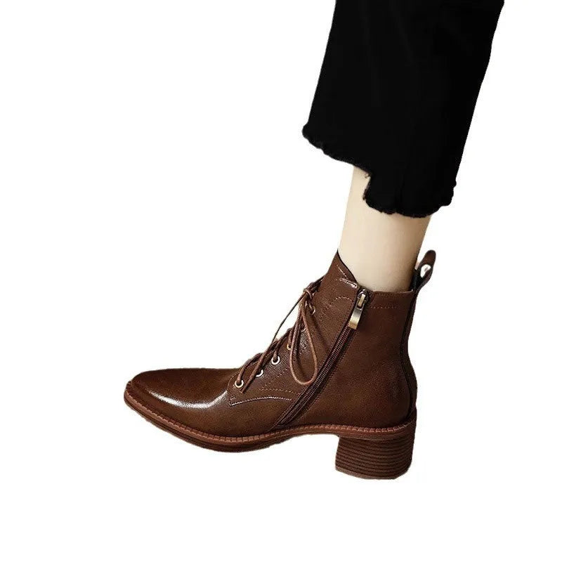 Women's black pointed toe ankle boots with 5.5cm heel and 13cm shaft height