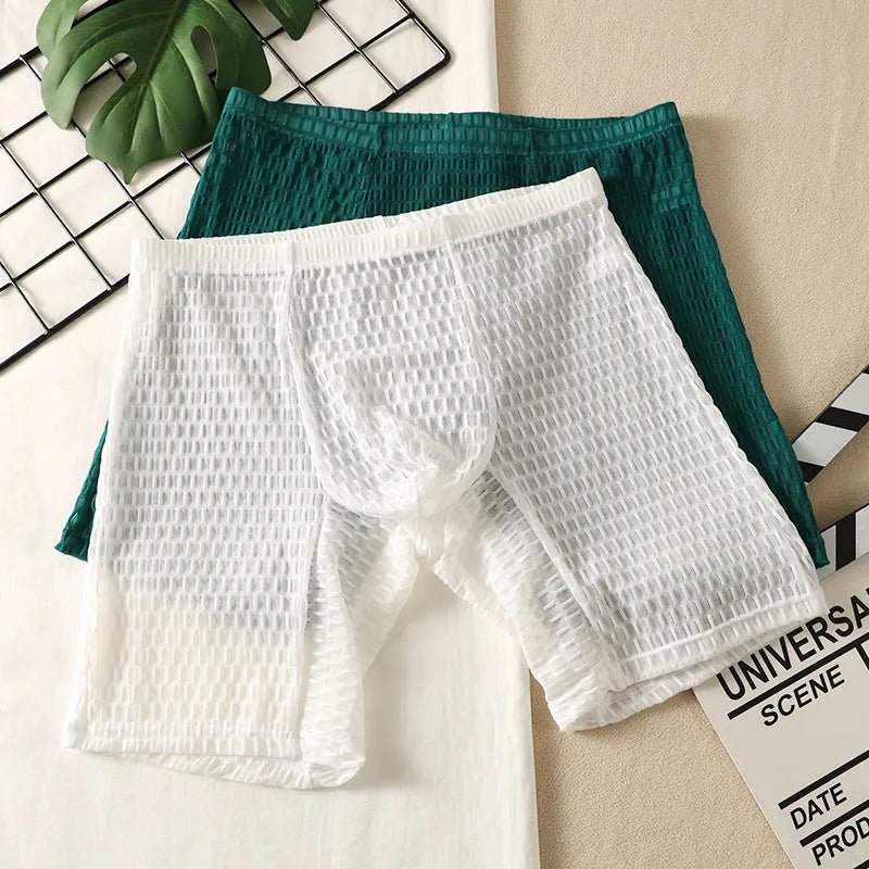 Men's solid colour lace boxer shorts with a hip-lifting fit on a size chart.
