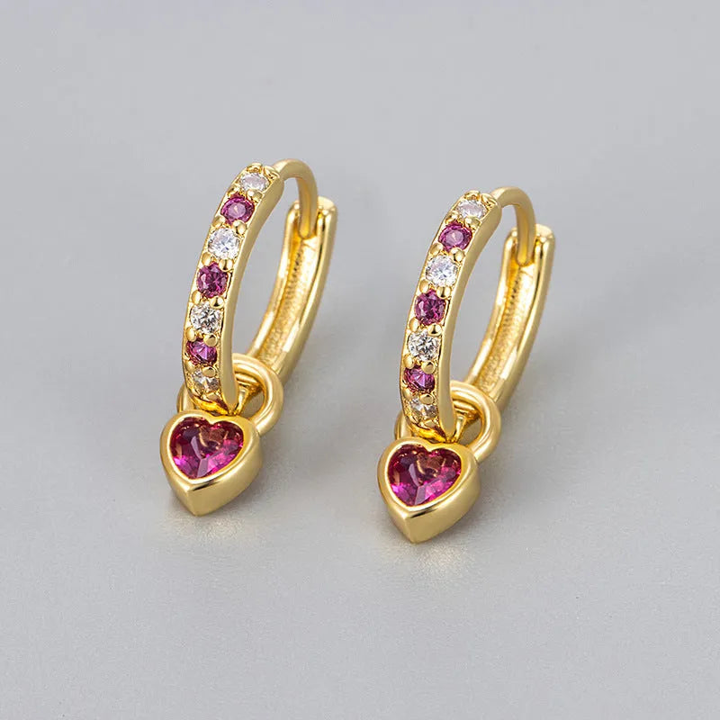 Women's fashion earrings with heart-shaped zircon eardrops in gold and white gold coloured settings