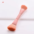 Ten professional makeup brushes with wooden handles arranged in a set, including powder, foundation and detail brushes