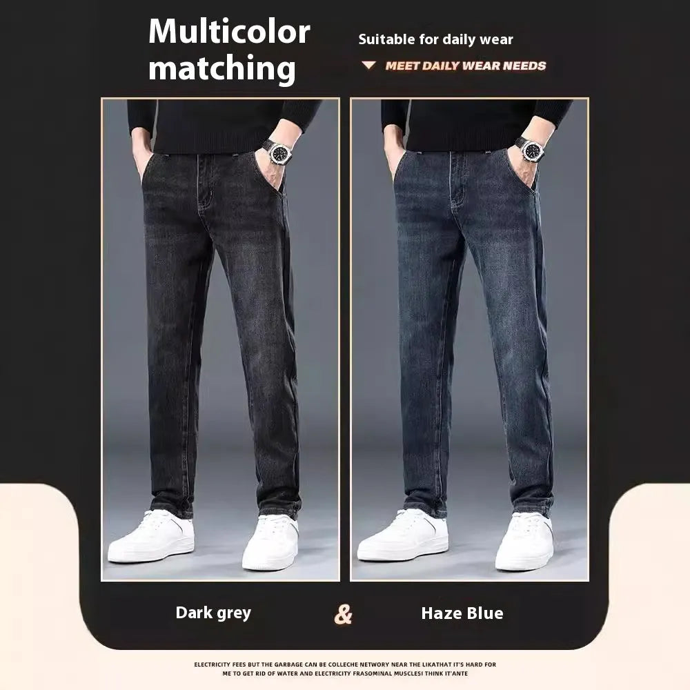 Man wearing blue grey slim straight casual trousers with a loose fit for summer street fashion.