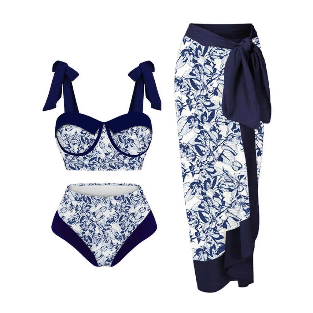 Women's printed split swimsuit three-piece set in a floral colour on a mannequin.