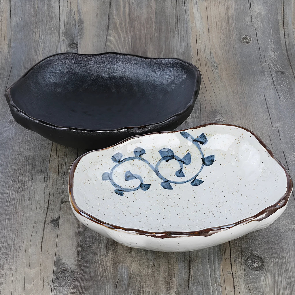 Japanese coarse pottery sashimi bowl with irregular shape and floral glaze decorations