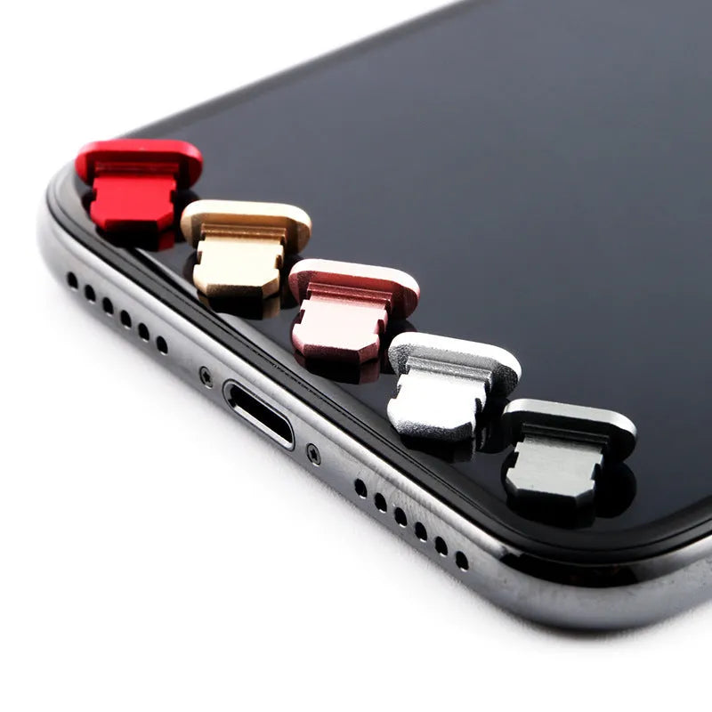 Aluminium alloy mobile phone charging port dust plug for iPhone, shown in a metallic colour.