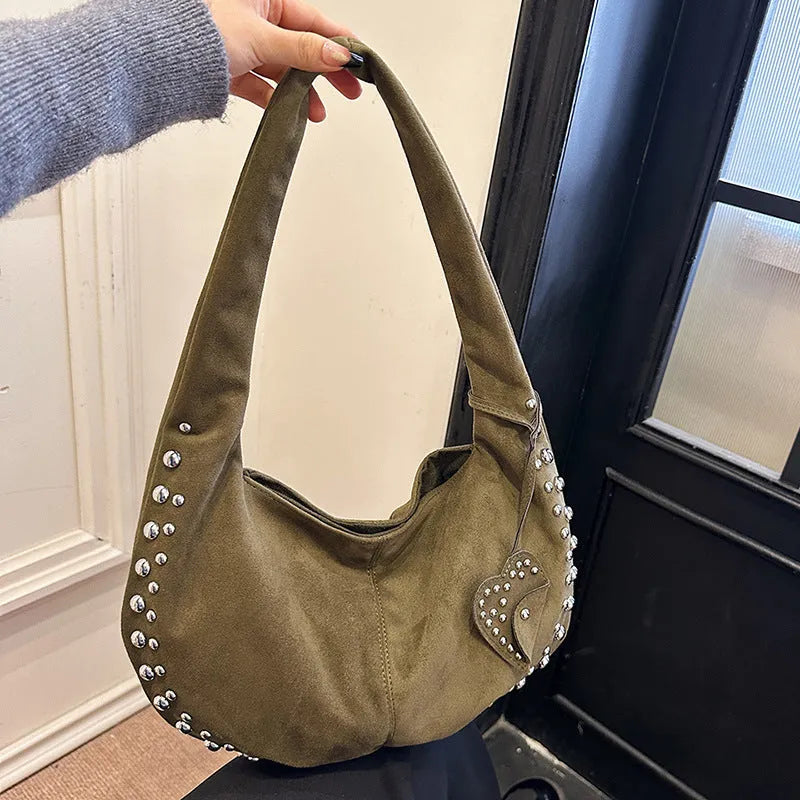 Soft plush strapless tote handbag in retro style showing colour options.