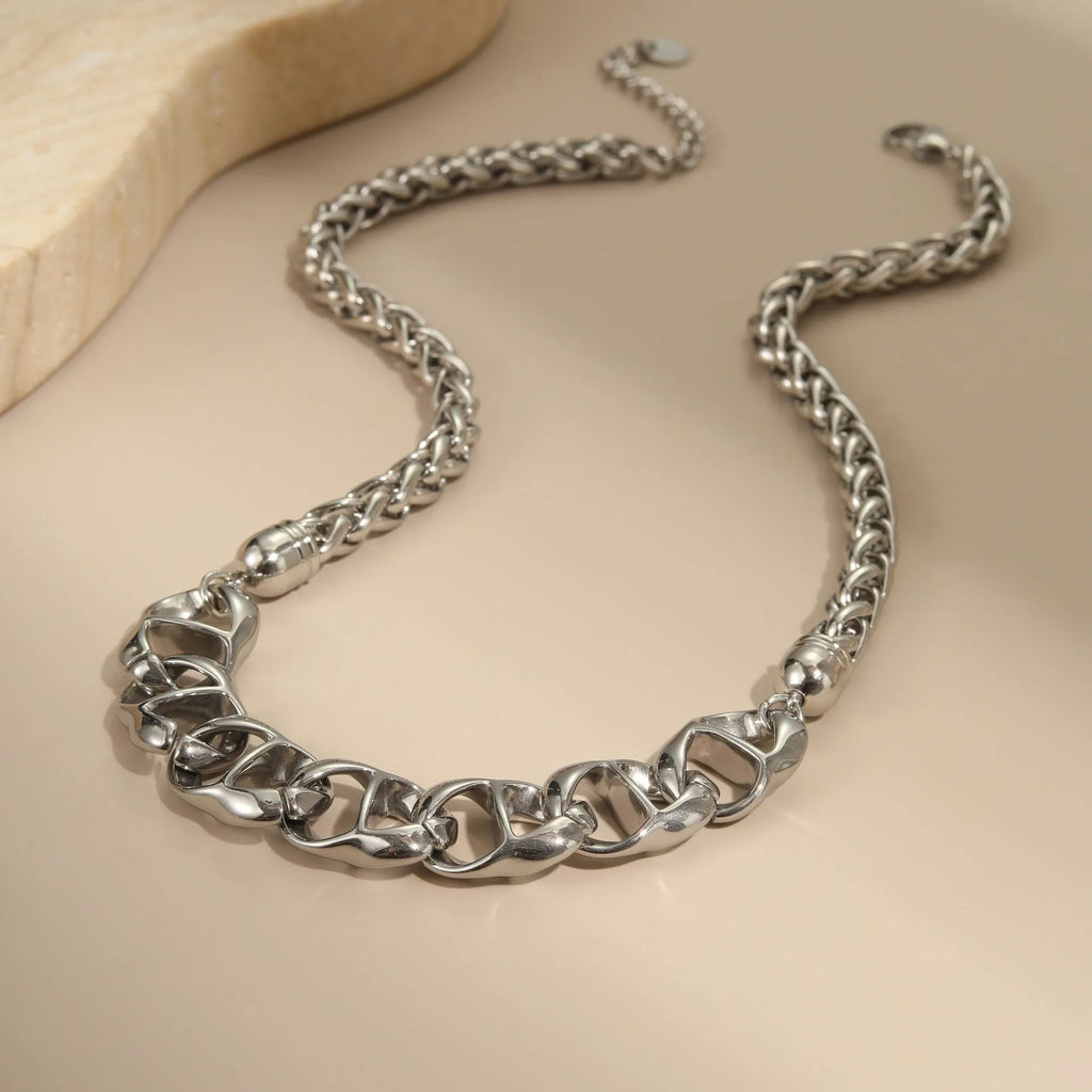 Stainless steel necklace with geometric pendant in gold plated or steel colour options