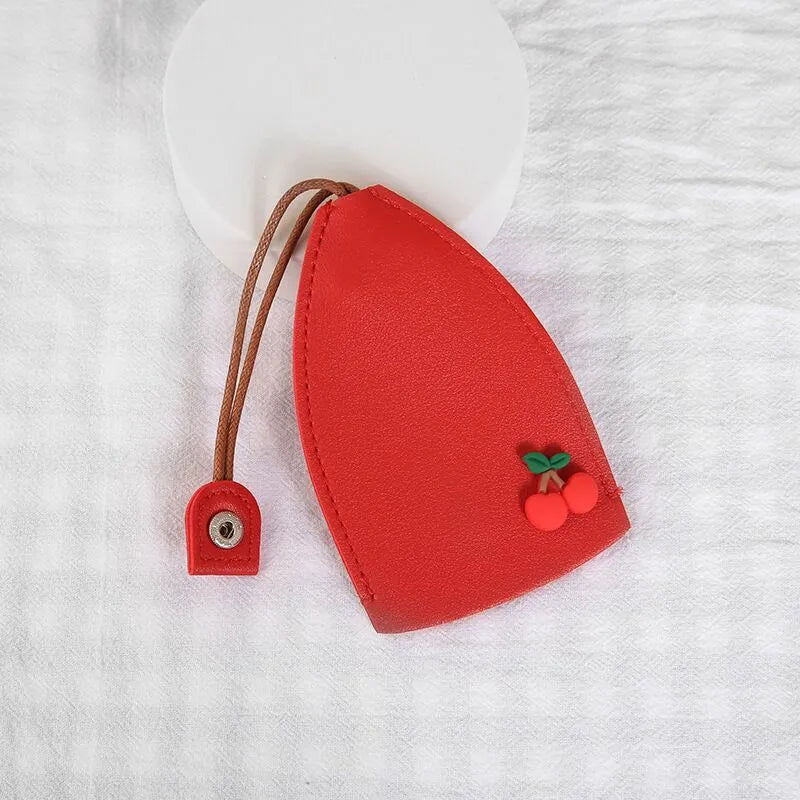 Cartoon-themed PU leather car key case with pull-out mechanism measuring 14x7.5 cm