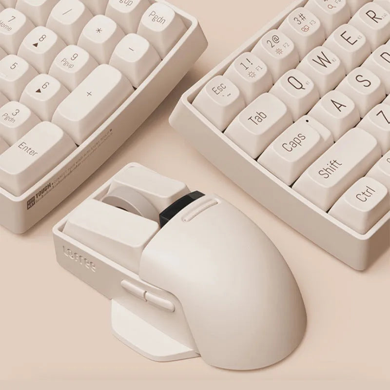 Xiaoqiao tofu-colour wireless mouse showing seven buttons and scroll wheel on desktop