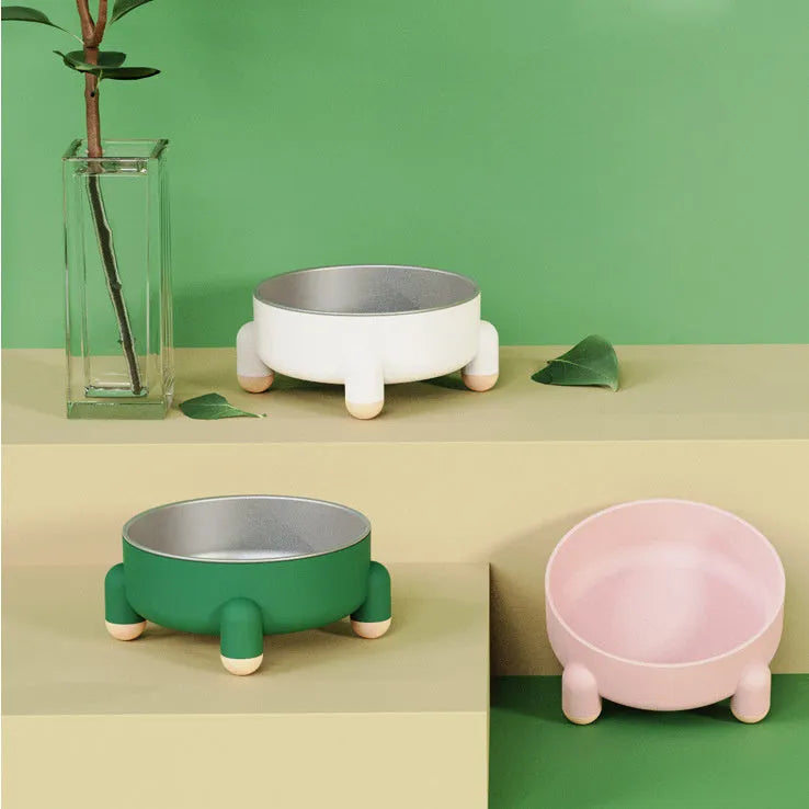 Green stainless steel pet bowl with a non-slip base and high foot for dogs and cats.