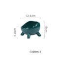 Green ceramic cat food bowl with four-legged stability base and wide mouth opening