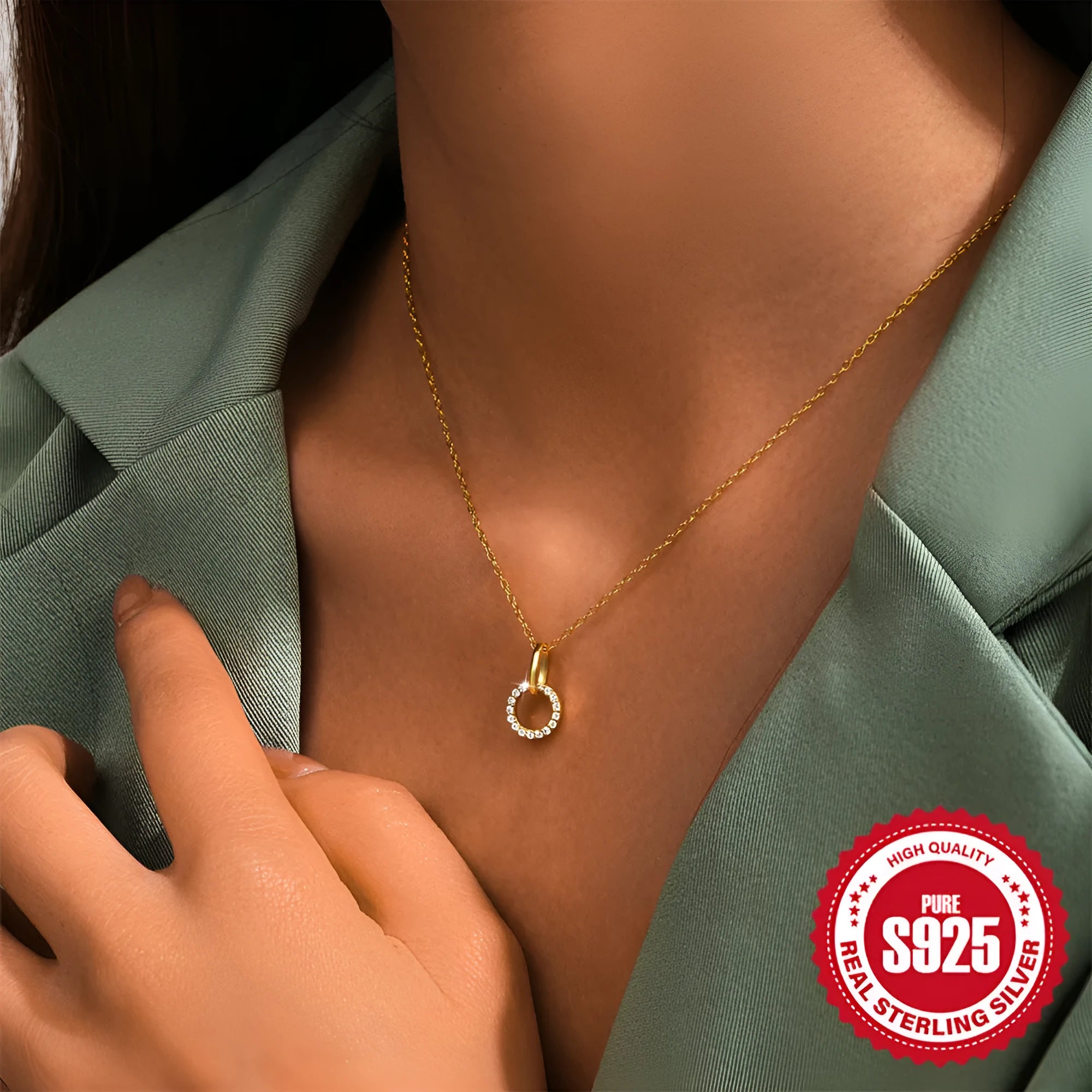 Gold colour S925 sterling silver clavicle chain necklace with a round zircon pendant on an adjustable chain.