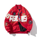 Black motorcycle-style baseball jacket with side pockets and a detachable hood on a hanger.