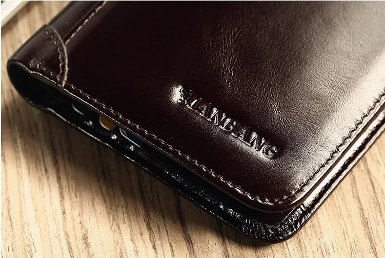 Men's brown leather bifold wallet open to show internal card slots, coin pocket, and photo holder.