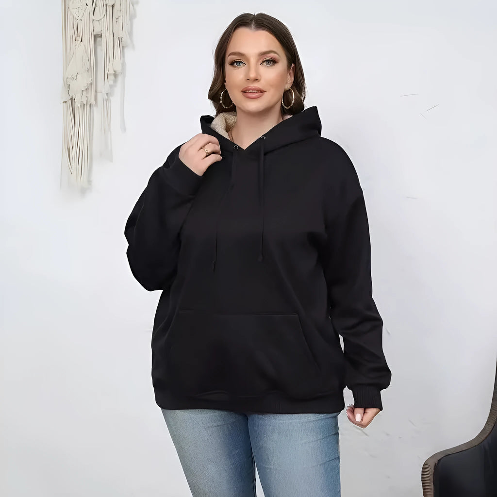 Women's thick grey hooded sweater with a 3D pattern and front pockets on a hanger.