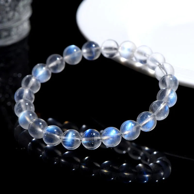 Natural cream body blue moonlight crystal bracelet with grinding treatment showing multiple size options