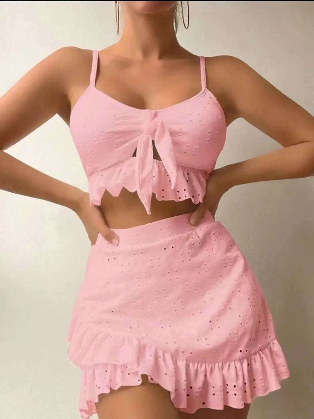 Women's three-piece bikini swimsuit with split hip skirt in multiple colour options