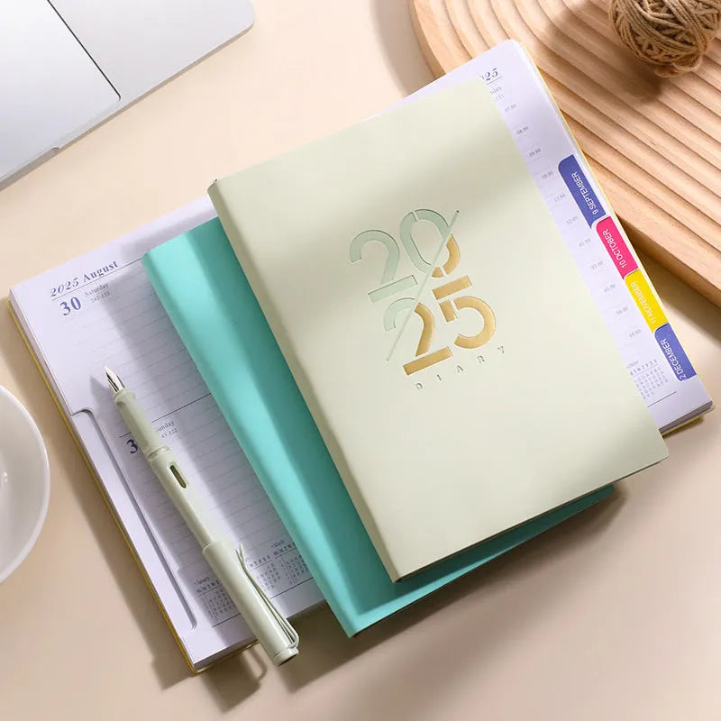 A5 daily planner with soft faux leather cover open to show dot grid pages
