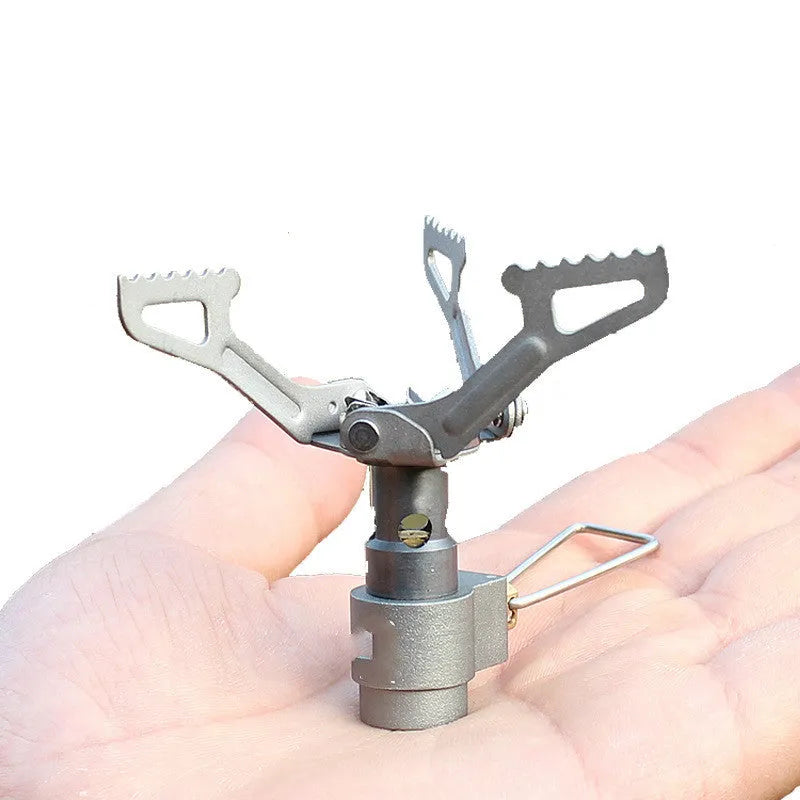 Portable propane gas camping stove with one-piece furnace construction for outdoor use