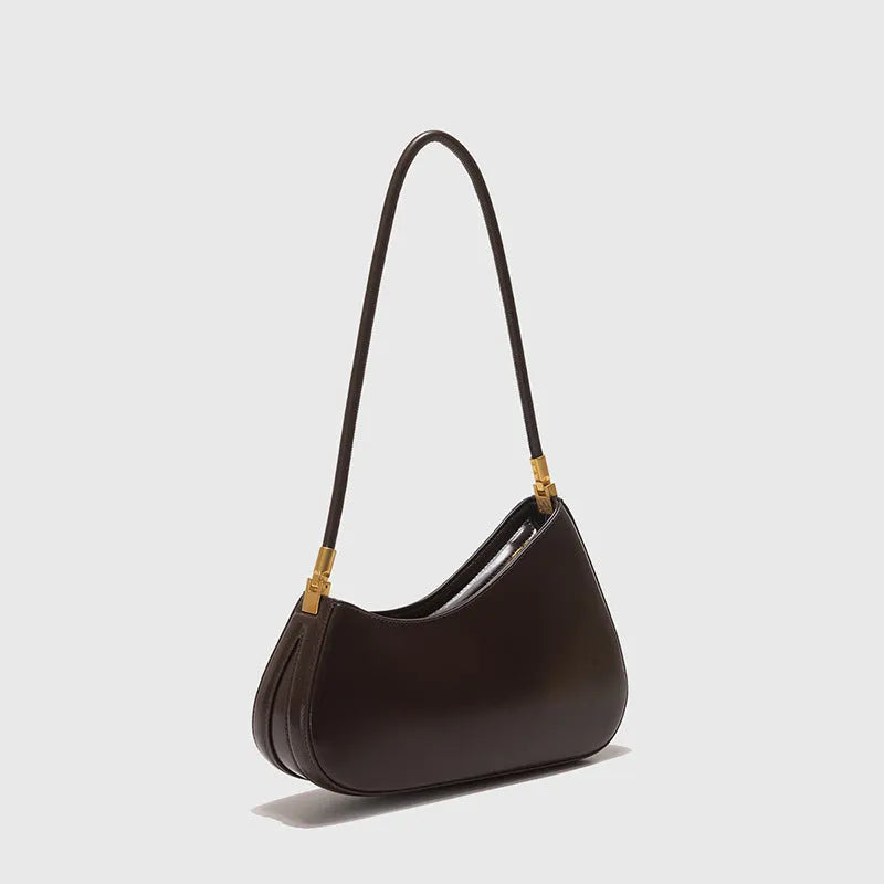 Structured oval women's underarm bag in PU leather with a single strap, shown in a colour option.