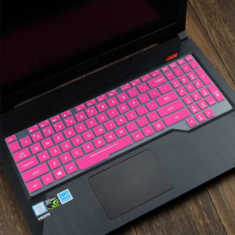 ASUS Flight laptop keyboard protective film cover shown in a translucent colour option on a laptop.