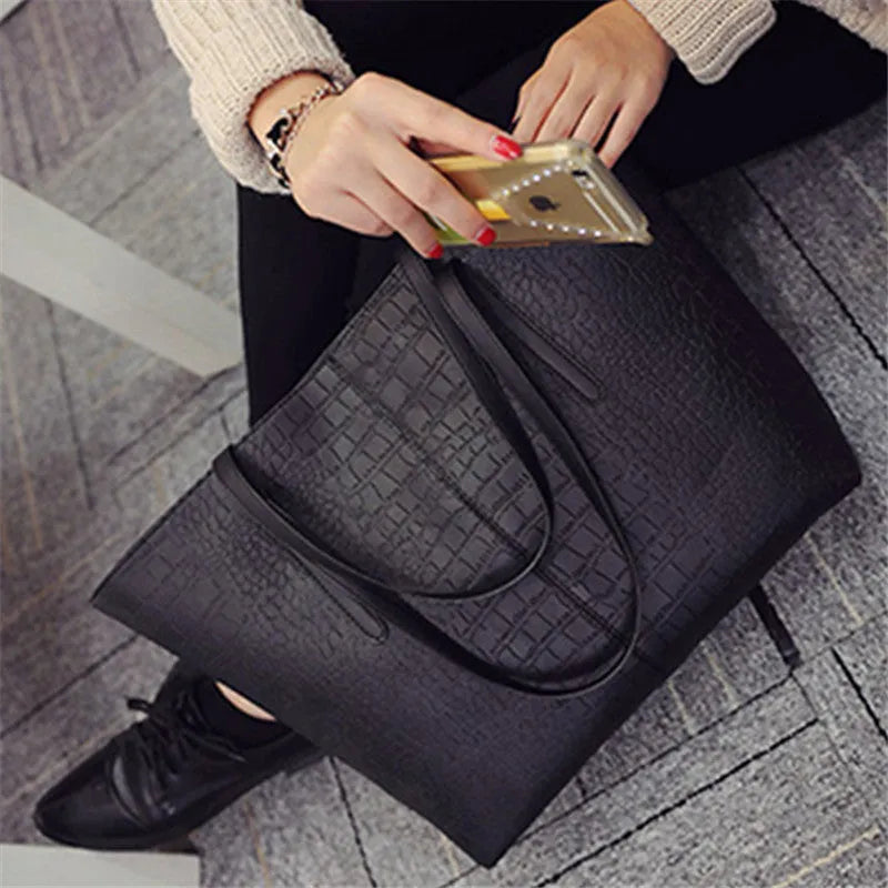 European simple fashion shoulder handbag for women in black and grey colours.