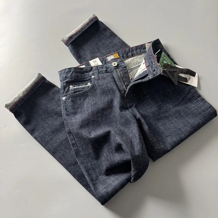 Men's straight leg denim trousers in primary colour with classic five-pocket styling