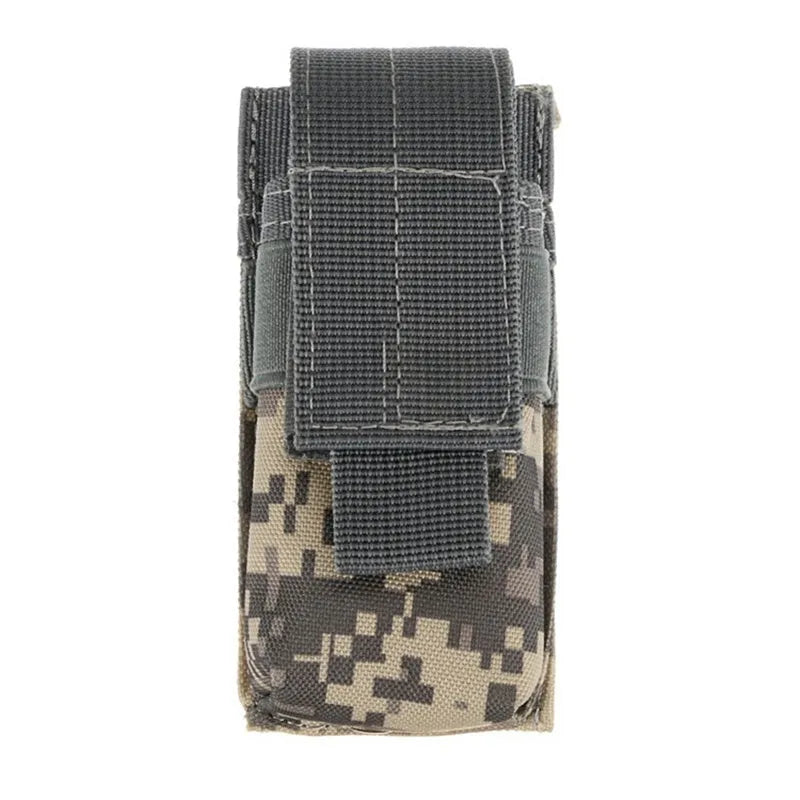 Black tactical MOLLE-compatible waist bag for pistol cartridges and small flashlights, shown with elastic cord buckle.
