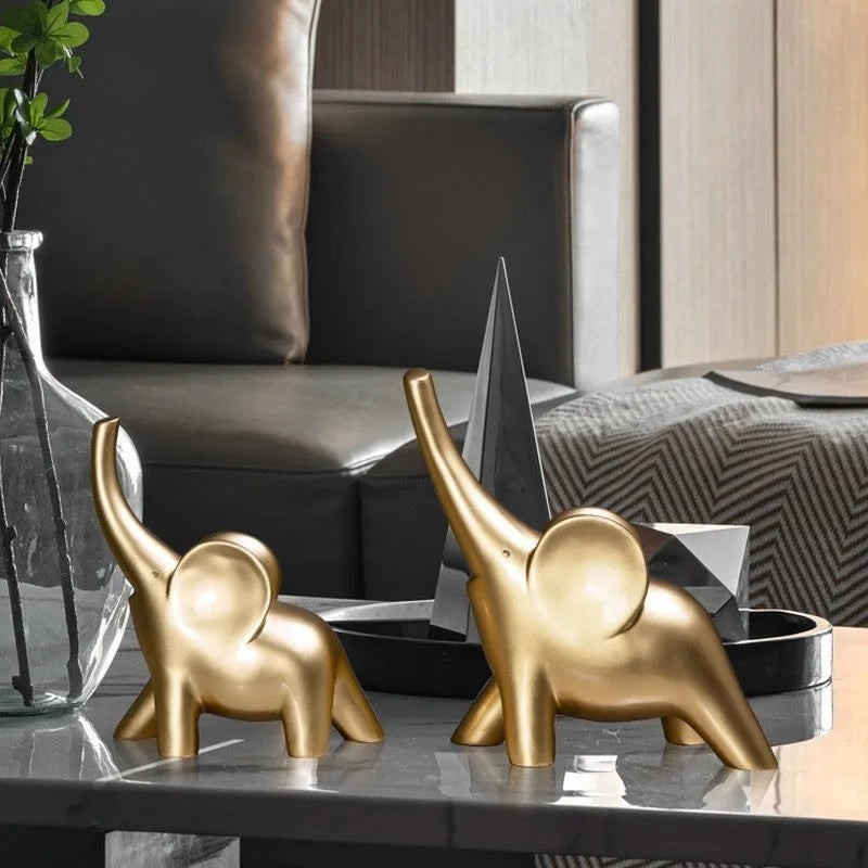 Modern rose gold and white resin elephant ornament figurine for home decor.