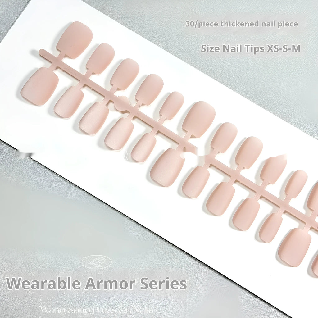 Set of frosted velvet false nails with Cat's Eye reflection in short ladder shapes on a display stand.