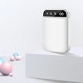 Mini power bank portable charger showing multi-U port output and compact plastic case design