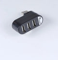 Black and white USB 2.0 hub splitter with multiple ports for computer laptop expansion