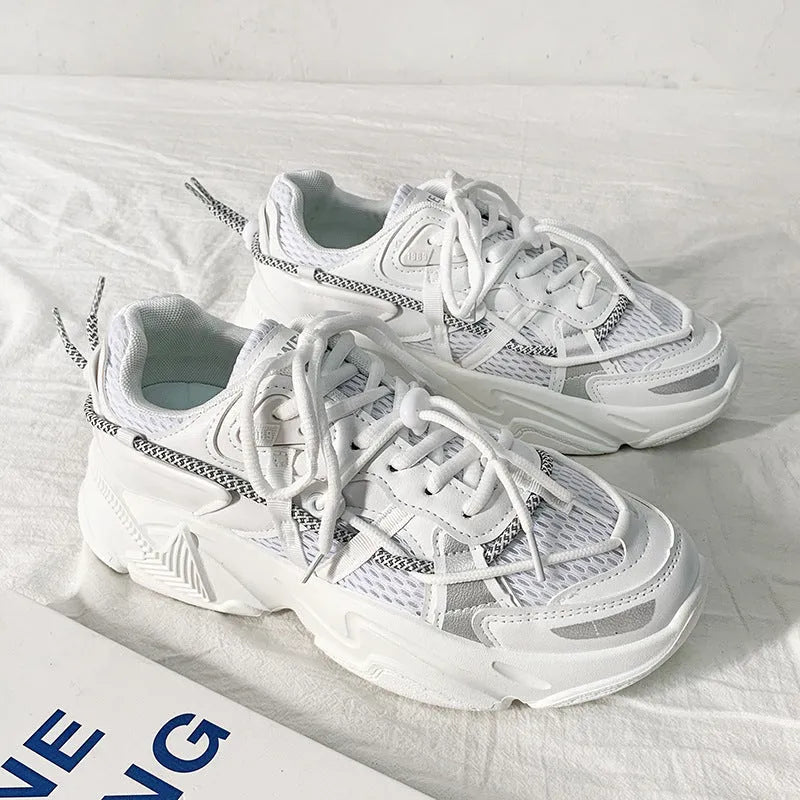 Men's white Korean style platform sneakers with lace-up front on a neutral background.