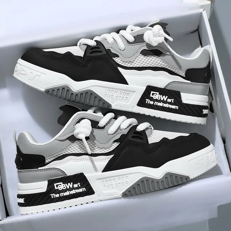 Men's white board shoes with soft rubber soles and mesh lining in low-top design