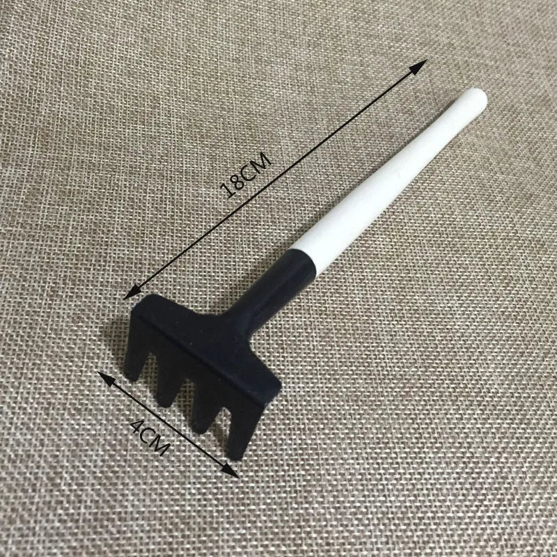 Succulent gardening tool set showing mini shovel, tweezers, watering can and transplant tools for small pot plants
