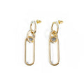Sterling silver geometric hoop earrings with ring and line design on silver background