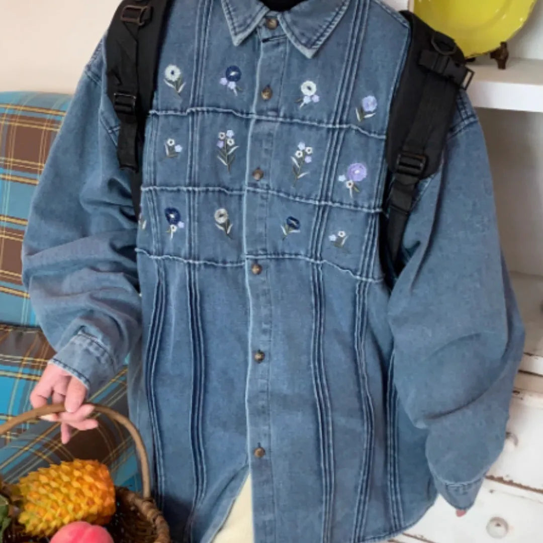 Vintage washed blue denim shirt with small floral embroidery and pleated front panel