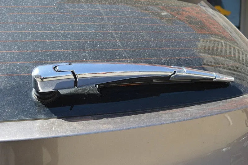 Set of four silvery ABS plastic rear window wiper cover trims for a 2010 Hyundai car.