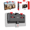 Black mobile phone game controller with adjustable metal trigger and telescopic fixing clip extended.