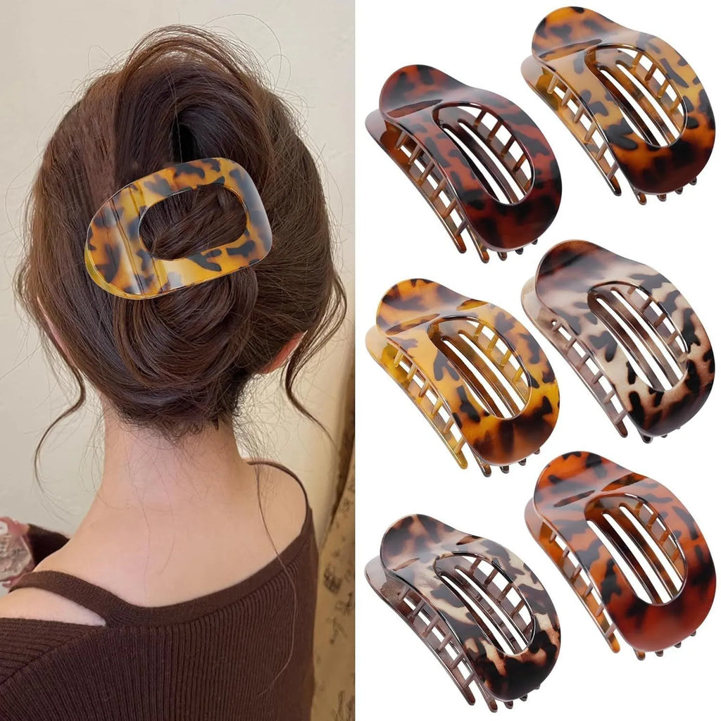 Six rose red plastic hair clips with frosted grip and pointed toe design