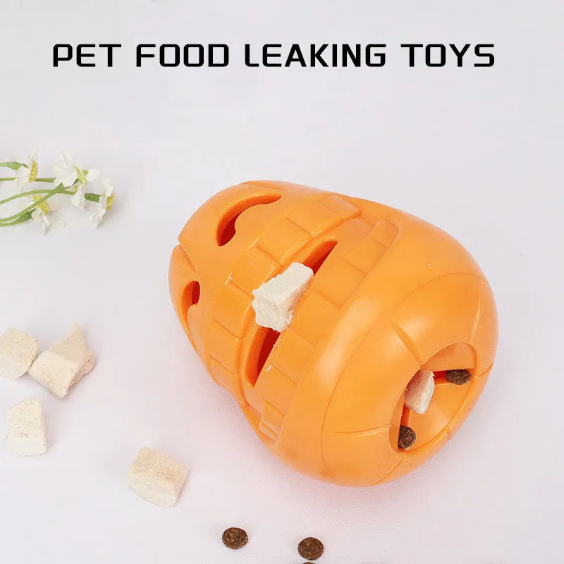 Orange Halloween pumpkin shaped dog chew toy with treat-dispensing funnel opening
