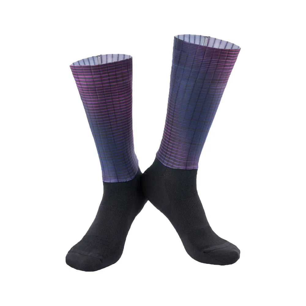 A pair of athletic cycling and running socks in a moisture-wicking fabric blend on a grey background.
