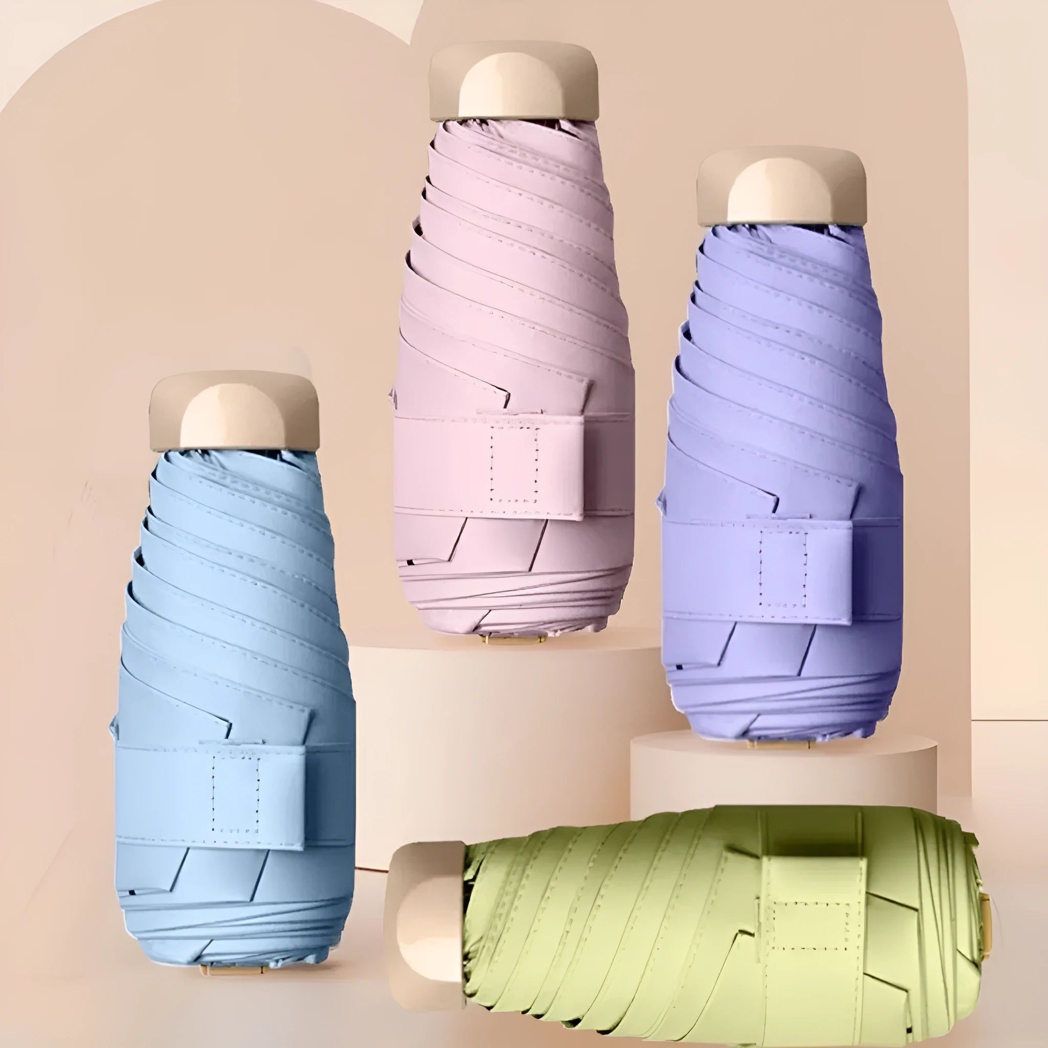 Closed five-fold manual umbrella showing one of eight colour options: beige, black, blue, dark green, navy blue, pink, yellow, or purple.