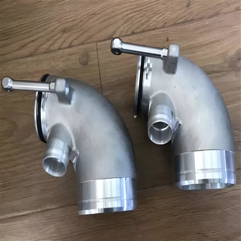 Aluminium alloy 90-degree turbine pipe elbow for lateral engine positioning in modified automotive applications