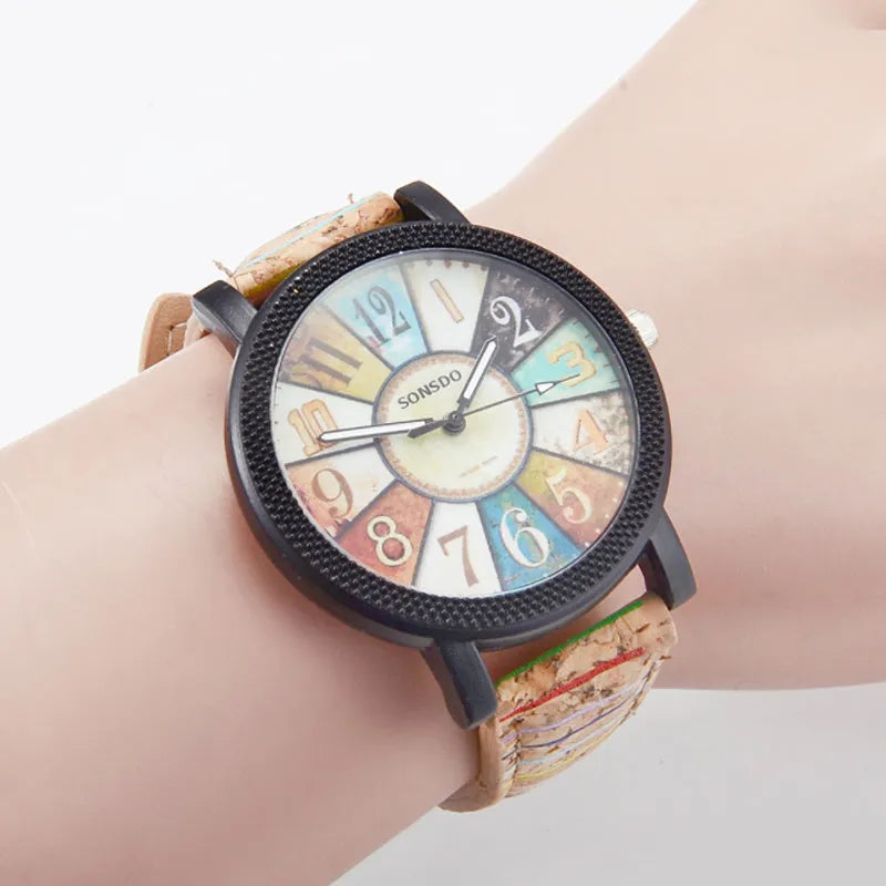 Women's vintage leather quartz watch with 37mm round dial and stainless steel buckle