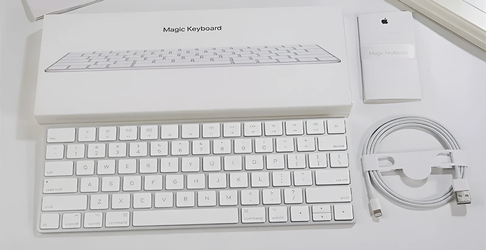 Apple G6 Bluetooth wireless keyboard in white colour with ultra-thin metal construction and multimedia function keys