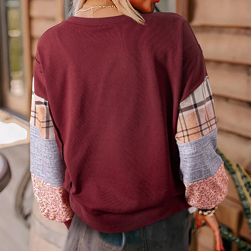 Women's loose fit long-sleeved top with beige and red plaid splicing pattern and pullover design