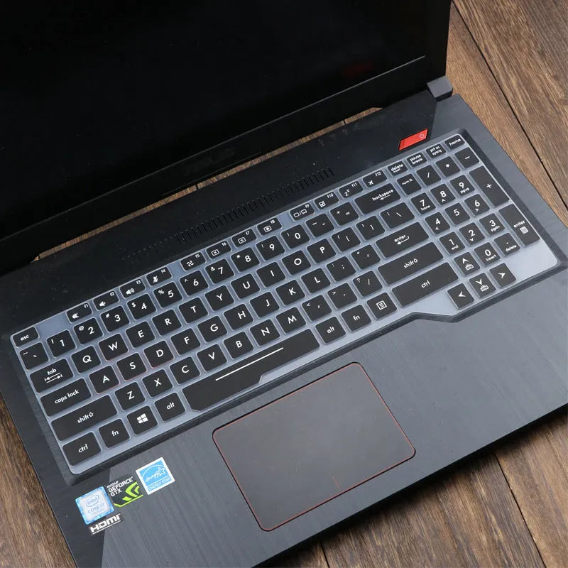 ASUS Flight laptop keyboard protective film cover shown in a translucent colour option on a laptop.